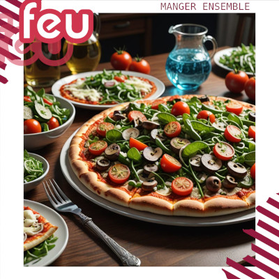 une table dressée, avec une pizza et d'autres plats